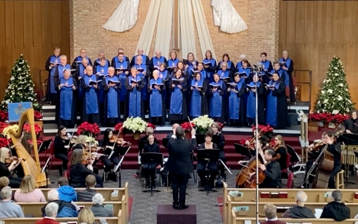 A picture of OPPC's Christmas Cantata with our own Music Director: Michael Pietranczyk conducting.