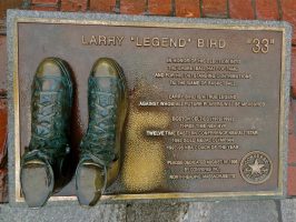 BOSTON, MASSACHUSETTS, Dec 23, 2013: basketball shoes belong to Celtics basketball player and are bronzed and displayed on a downtown Boston sidewalk.